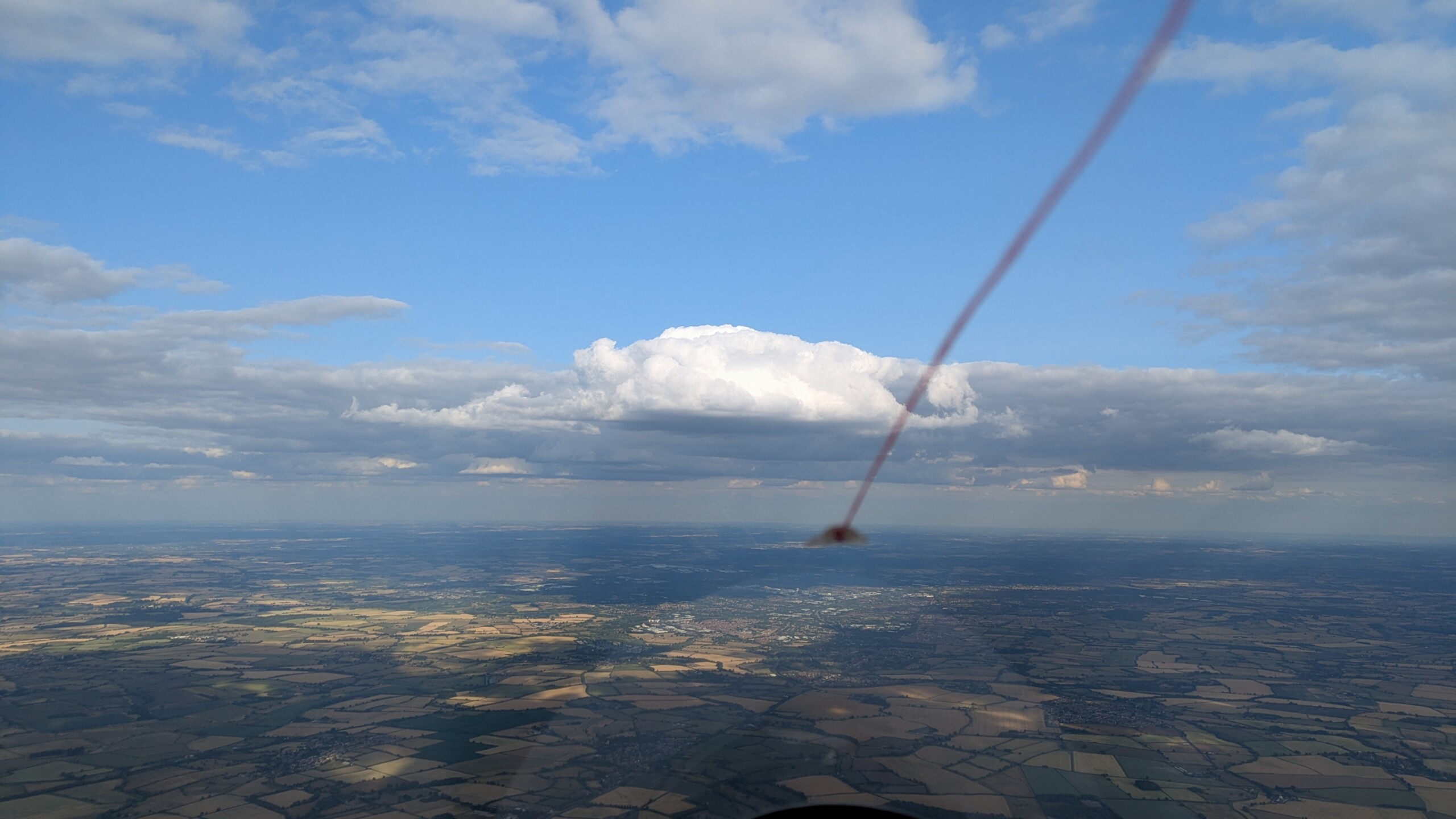 This nice Cu in the sunny gap above Milton Keynes has to work and get my trusty Mosquito onto glide!